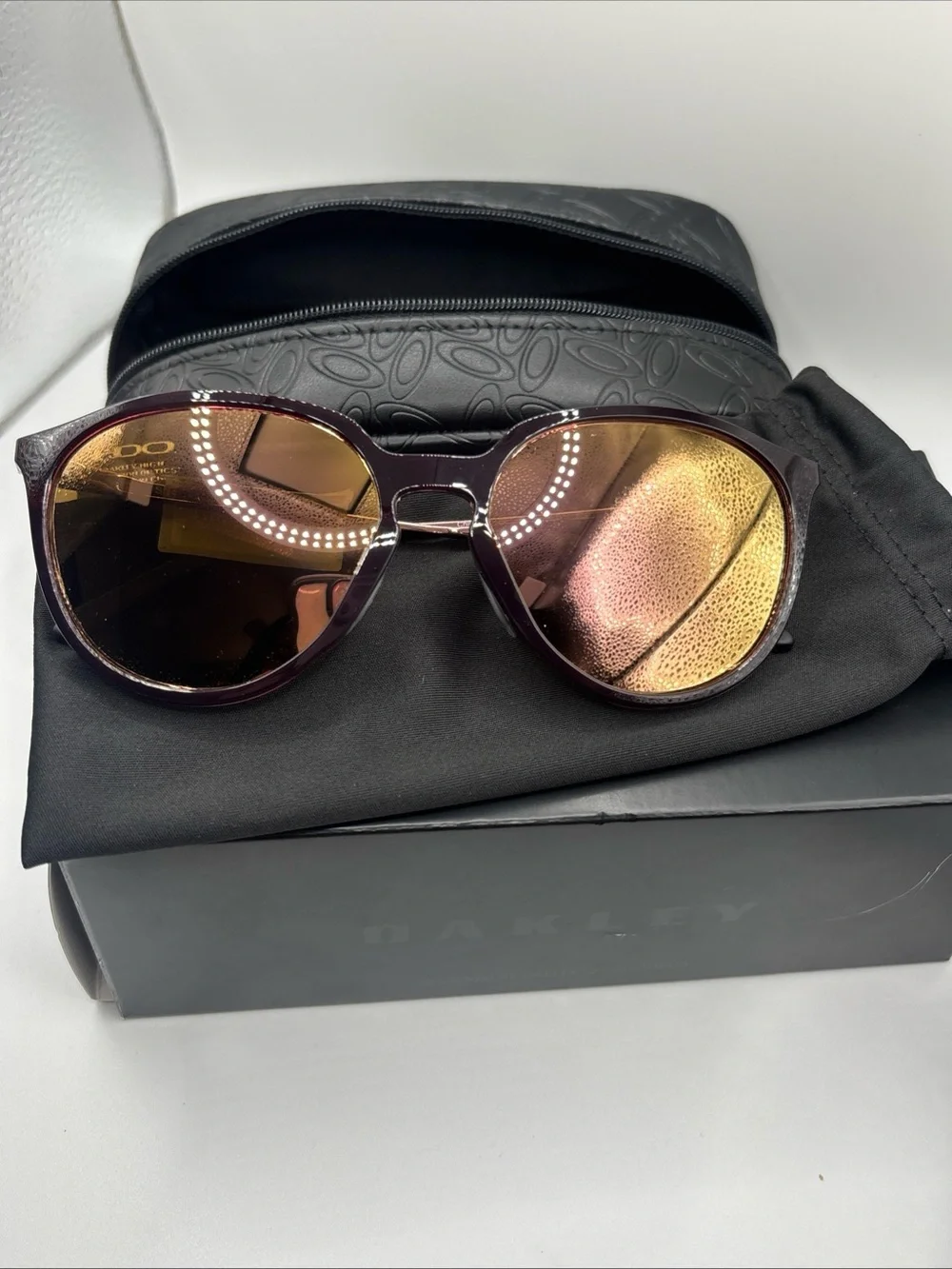 Oakley Sielo Sunglasses - Crystal Raspberry Frame with Rose Gold Lenses